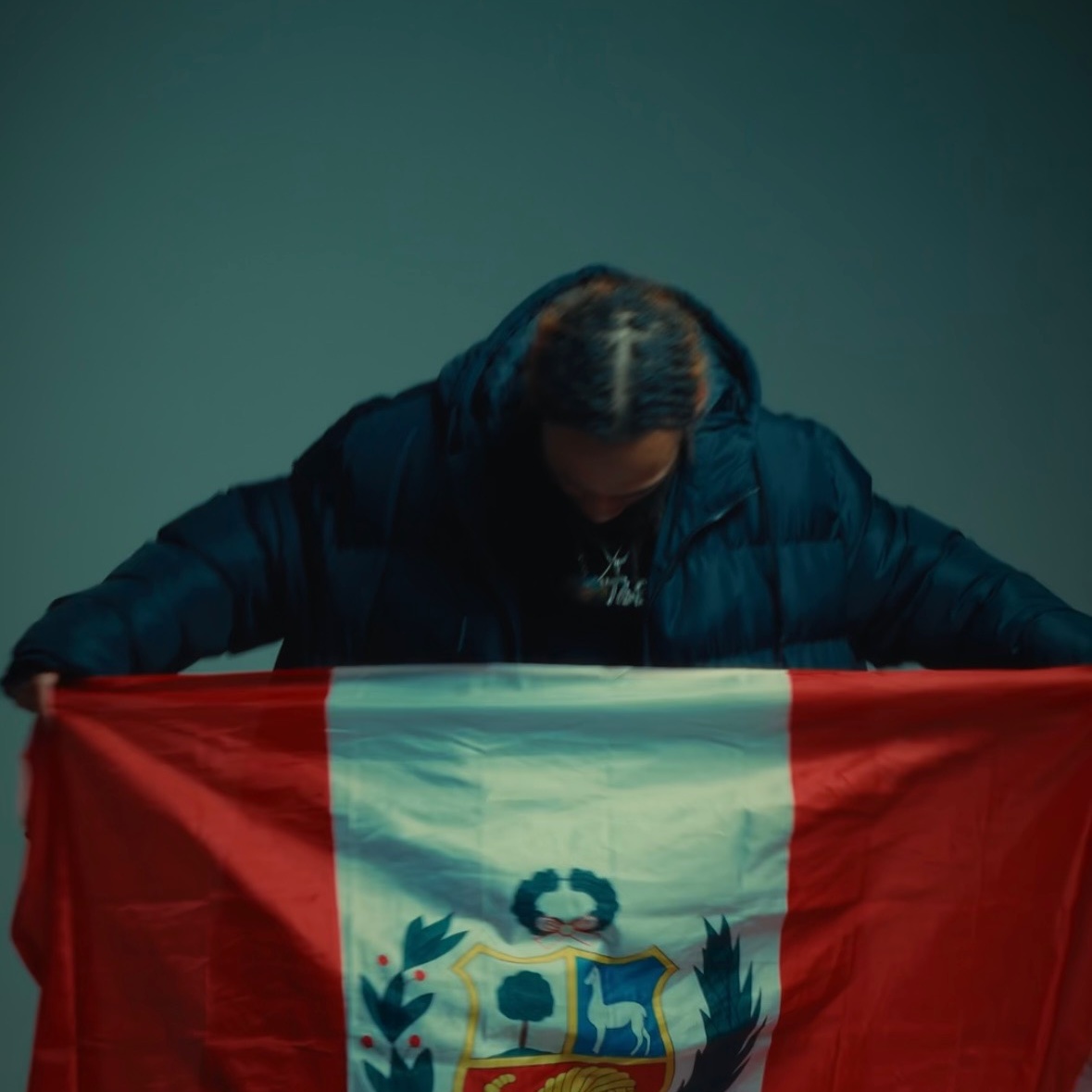 King Zeus draped in the Peruvian flag